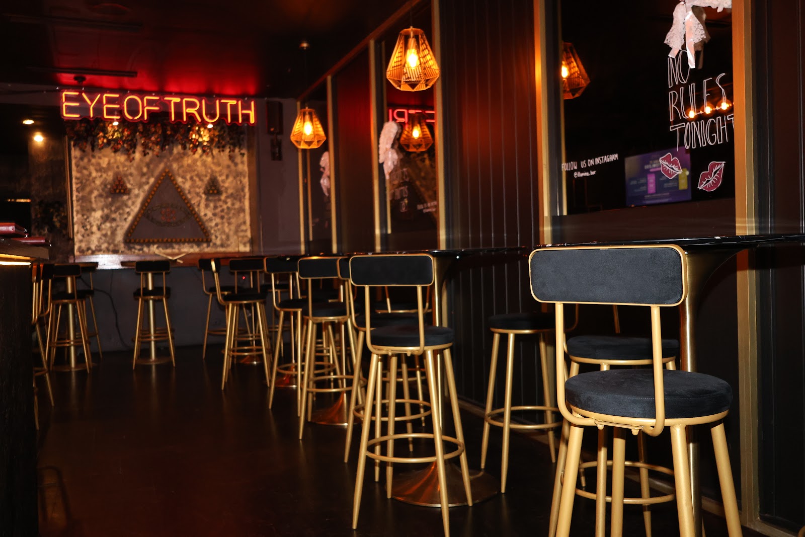 The black-and-gold lounge seating inside Illumina Prahran